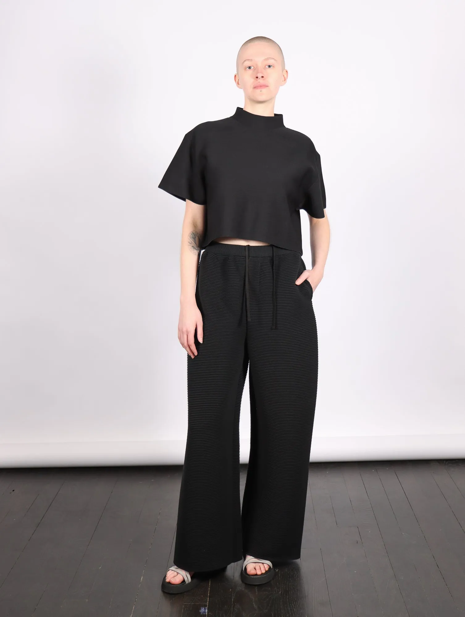 Stratum Wide Straight Pants in Black by CFCL