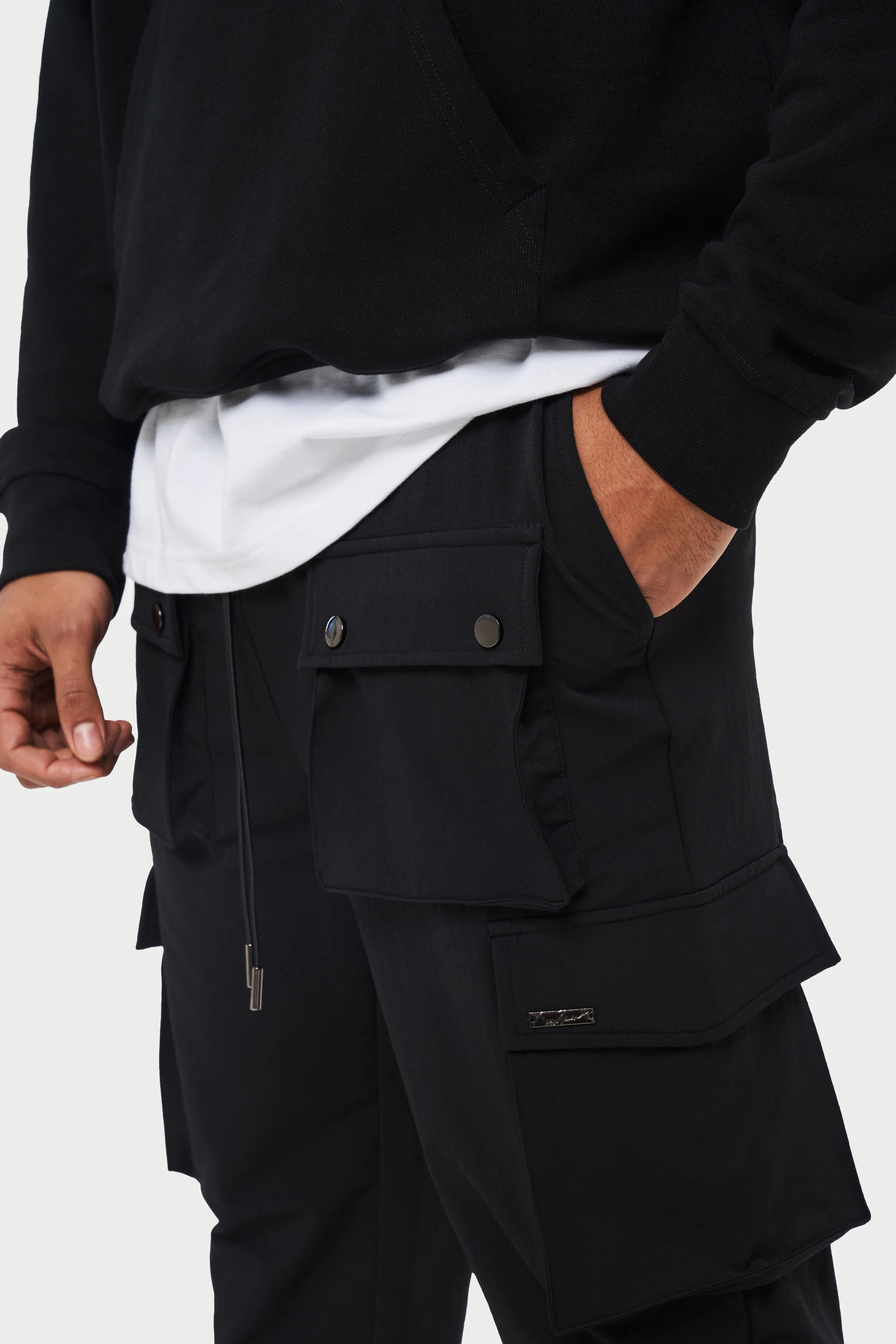 TECHNICAL STRETCH POPPER DETAIL CARGO PANTS - BLACK